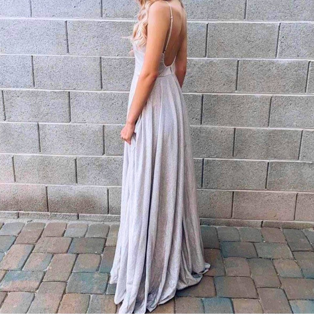 This was my prom dress in 2022. It’s size XS and it’s pink/silver.